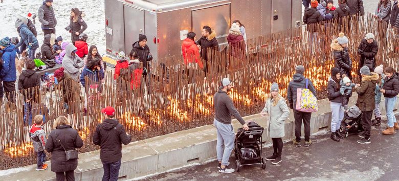 people enjoying a wam fire at central park, university of calgary